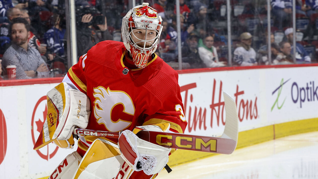 CALGARY, AB - JANUARY 18: Dustin Wolf #32 of the Calgary Flames skates during warmup prior to the game against the Toronto Maple Leafs at Scotiabank Saddledome on January 18, 2024 in Calgary, Alberta, Canada.