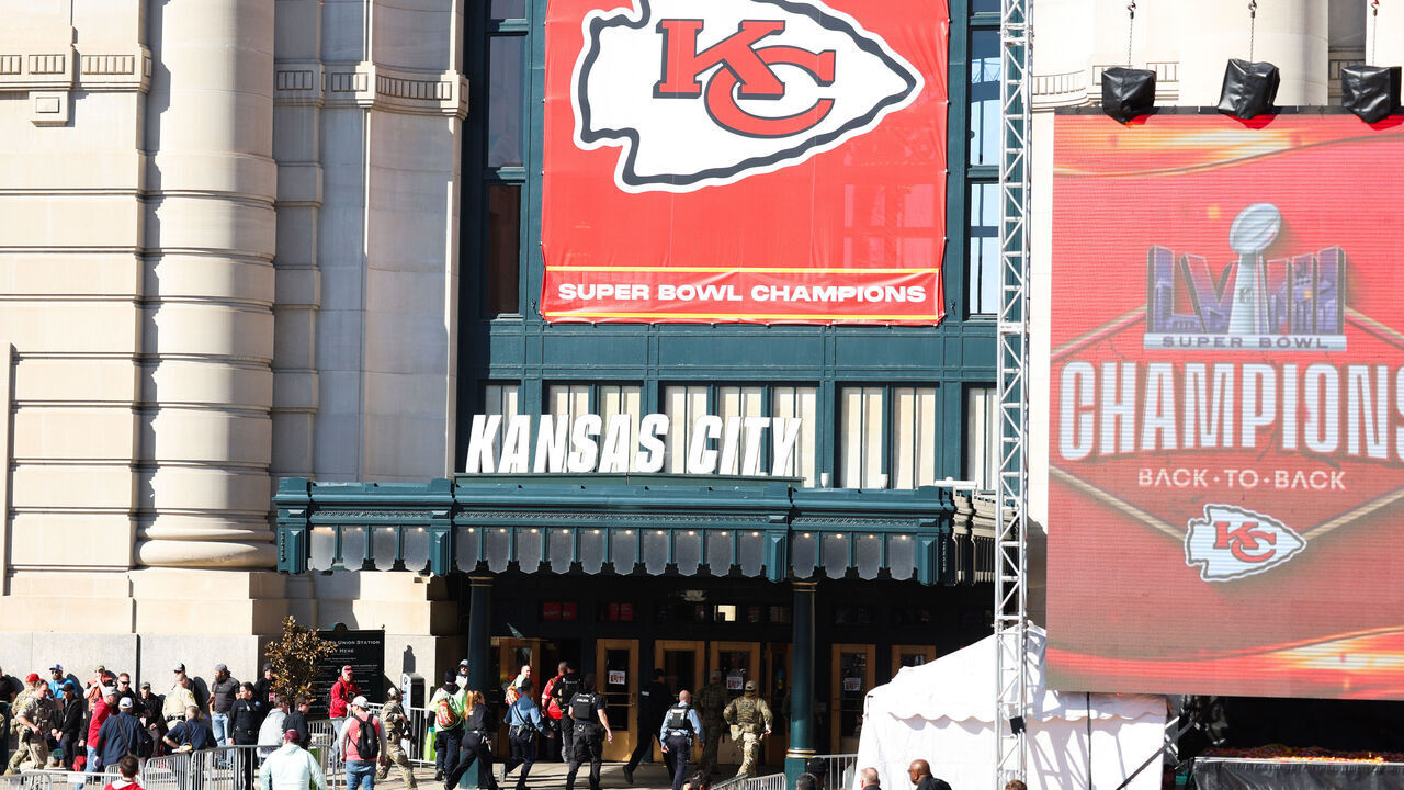 KANSAS CITY, MISSOURI - FEBRUARY 14: Law enforcement and medical personnel respond to a shooting at Union Station during the Kansas City Chiefs Super Bowl LVIII victory parade on February 14, 2024 in Kansas City, Missouri. Several people were shot and two people were detained after a rally celebrating the Chiefs Super Bowl victory.