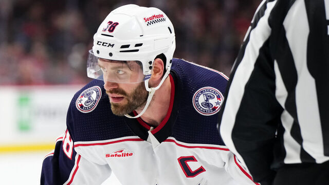 OTTAWA, CANADA - FEBRUARY 13: Boone Jenner #38 of the Columbus Blue Jackets prepares for a faceoff against the Ottawa Senators at Canadian Tire Centre on February 13, 2024 in Ottawa, Ontario, Canada.