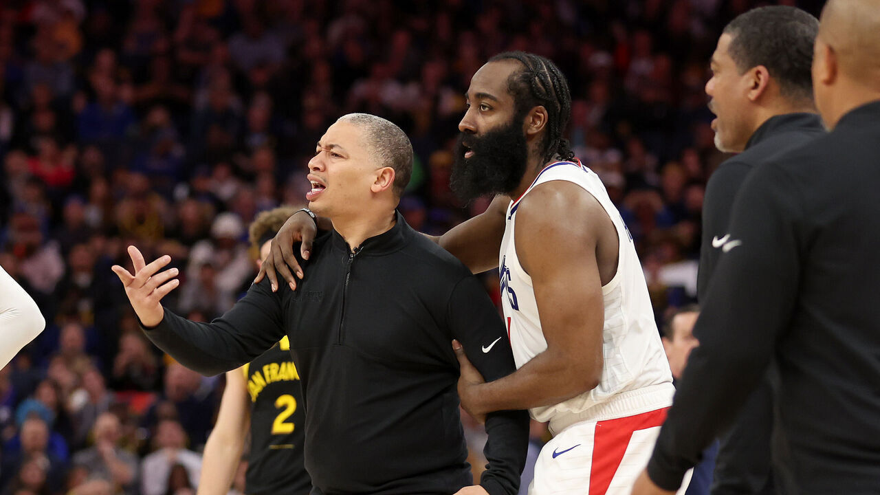 SAN FRANCISCO, CALIFORNIA - FEBRUARY 14: James Harden #1 of the LA Clippers holds back head coach Tyronn Lue, who was complaining about a call, during their game against the Golden State Warriors in the second half at Chase Center on February 14, 2024 in San Francisco, California.