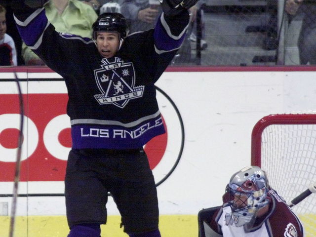 PHOTO: Nelson Emerson takes the Stanley Cup to Tim Horton's