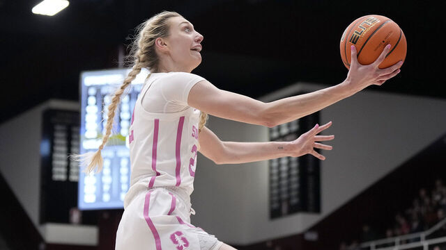 PALO ALTO, CALIFORNIA - FEBRUARY 04: Cameron Brink #22 of the Stanford Cardinal goes in for a layup on a fast break against the UCLA Bruins during the fourth quarter at Stanford Maples Pavilion on February 04, 2024 in Palo Alto, California.