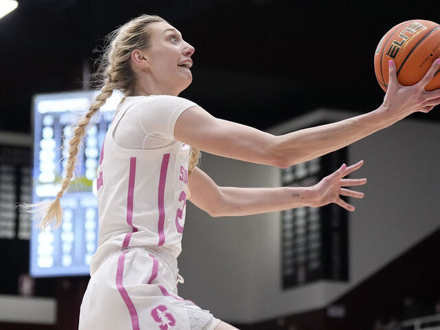 PALO ALTO, CALIFORNIA - FEBRUARY 04: Cameron Brink #22 of the Stanford Cardinal goes in for a layup on a fast break against the UCLA Bruins during the fourth quarter at Stanford Maples Pavilion on February 04, 2024 in Palo Alto, California.