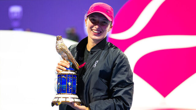 DOHA, QATAR - FEBRUARY 17: Iga Swiatek of Poland poses with the champions trophy after defeating Elena Rybakina of Kazakhstan in the singles final on Day 7 of the Qatar TotalEnergies Open, part of the Hologic WTA Tour at Khalifa International Tennis and Squash Complex on February 17, 2024 in Doha, Qatar
