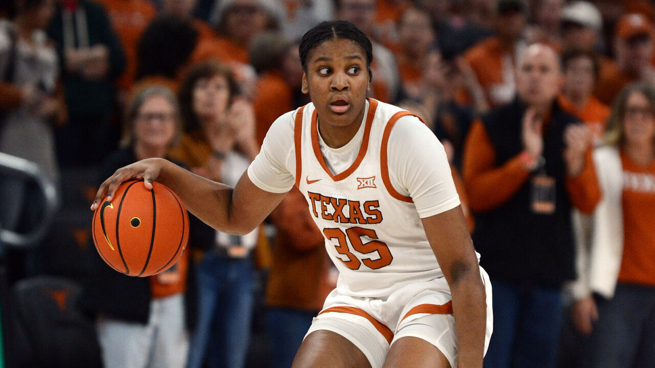 AUSTIN, TX - FEBRUARY 04: Texas Longhorns guard Madison Booker moves the ball down court during game featuring the Kansas State Wildcats and Texas Longhorns on February 4, 2024, at the Moody Center in Austin, TX.