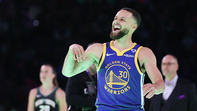 INDIANAPOLIS, INDIANA - FEBRUARY 17: Stephen Curry #30 of the Golden State Warriors participates in a 3-point challenge against Sabrina Ionescu #20 of the New York Liberty during the State Farm All-Star Saturday Night at Lucas Oil Stadium on February 17, 2024 in Indianapolis, Indiana.