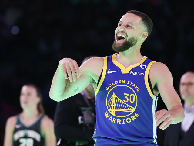 INDIANAPOLIS, INDIANA - FEBRUARY 17: Stephen Curry #30 of the Golden State Warriors participates in a 3-point challenge against Sabrina Ionescu #20 of the New York Liberty during the State Farm All-Star Saturday Night at Lucas Oil Stadium on February 17, 2024 in Indianapolis, Indiana.