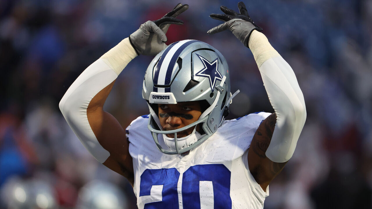 ORCHARD PARK, NEW YORK - DECEMBER 17: Tony Pollard #20 of the Dallas Cowboys on the field before game against the Buffalo Bills at Highmark Stadium on December 17, 2023 in Orchard Park, New York.