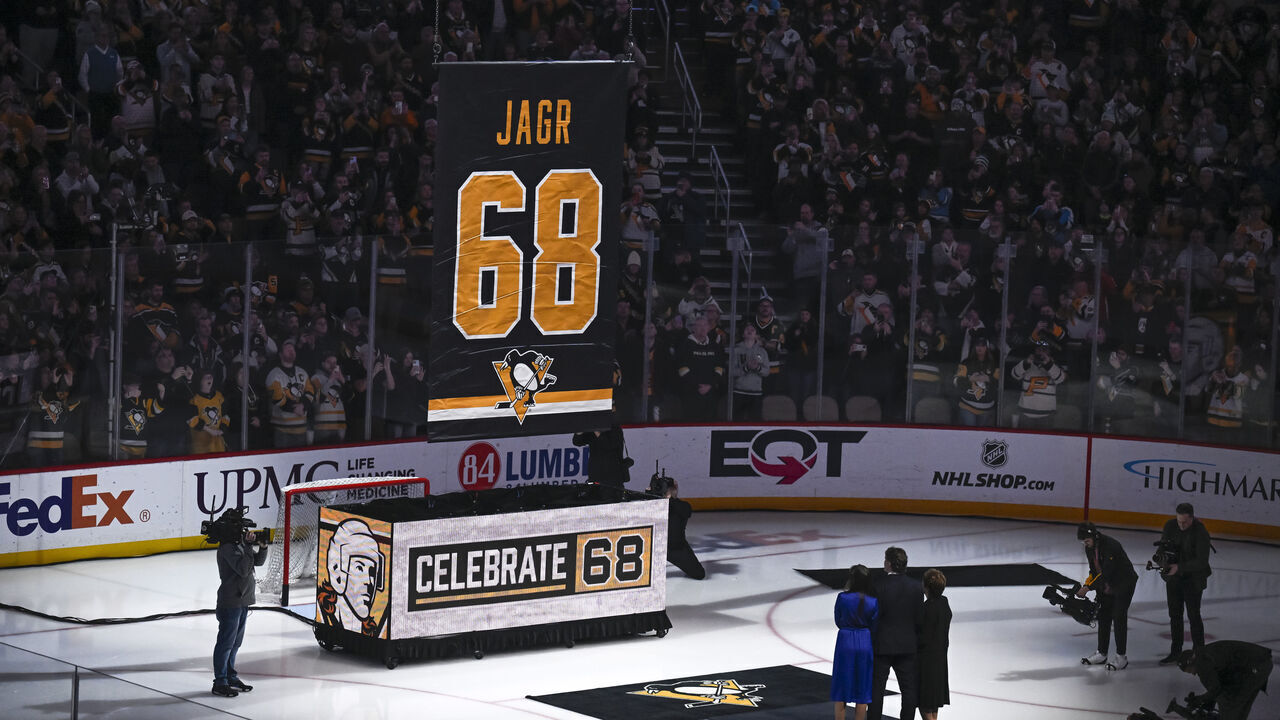 PITTSBURGH, PA - FEBRUARY 18: Former Pittsburgh Penguins right wing Jaromir Jagr's number 68 jersey is retired in a pregame ceremony prior to the game between the Pittsburgh Penguins and the Los Angeles Kings on February 18, 2024, at PPG Paints Arena in Pittsburgh, PA.