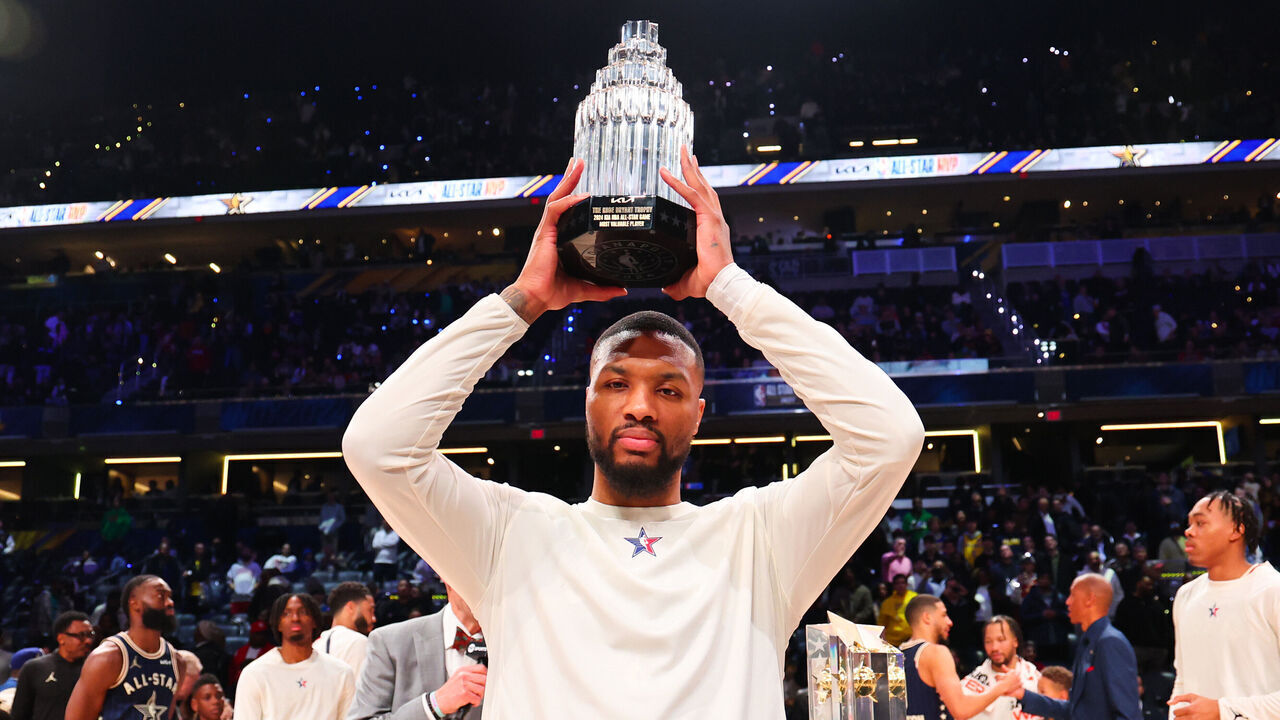 INDIANAPOLIS, INDIANA - FEBRUARY 18: Damian Lillard #0 of the Milwaukee Bucks poses for a photo with the Kobe Bryant All-Star MVP trophy during the 2024 NBA All-Star Game at Gainbridge Fieldhouse on February 18, 2024 in Indianapolis, Indiana.