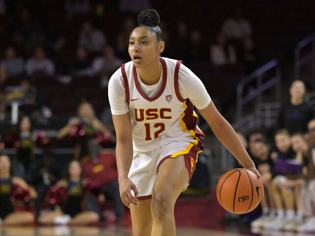 LOS ANGELES, CALIFORNIA - JANUARY 28: JuJu Watkins #12 of the USC Trojans handles the ball against the Washington Huskies at Galen Center on January 28, 2024 in Los Angeles, California.