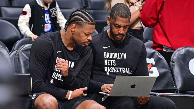 LOS ANGELES, CA - JANUARY 21: Dennis Smith Jr. #4 and Assistant Coach Kevin Ollie of the Brooklyn Nets look at film before the game against the LA Clippers on January 21, 2024 at Crypto.Com Arena in Los Angeles, California. NOTE TO USER: User expressly acknowledges and agrees that, by downloading and/or using this Photograph, user is consenting to the terms and conditions of the Getty Images License Agreement. Mandatory Copyright Notice: Copyright 2024 NBAE
