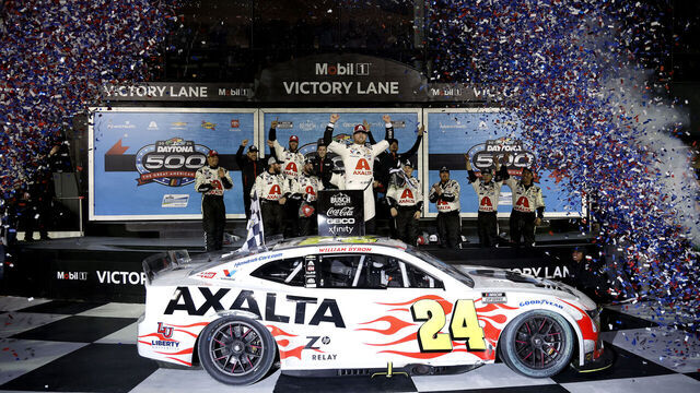 DAYTONA BEACH, FLORIDA - FEBRUARY 19: William Byron, driver of the #24 Axalta Chevrolet, celebrates in victory lane after winning the NASCAR Cup Series Daytona 500 at Daytona International Speedway on February 19, 2024 in Daytona Beach, Florida.