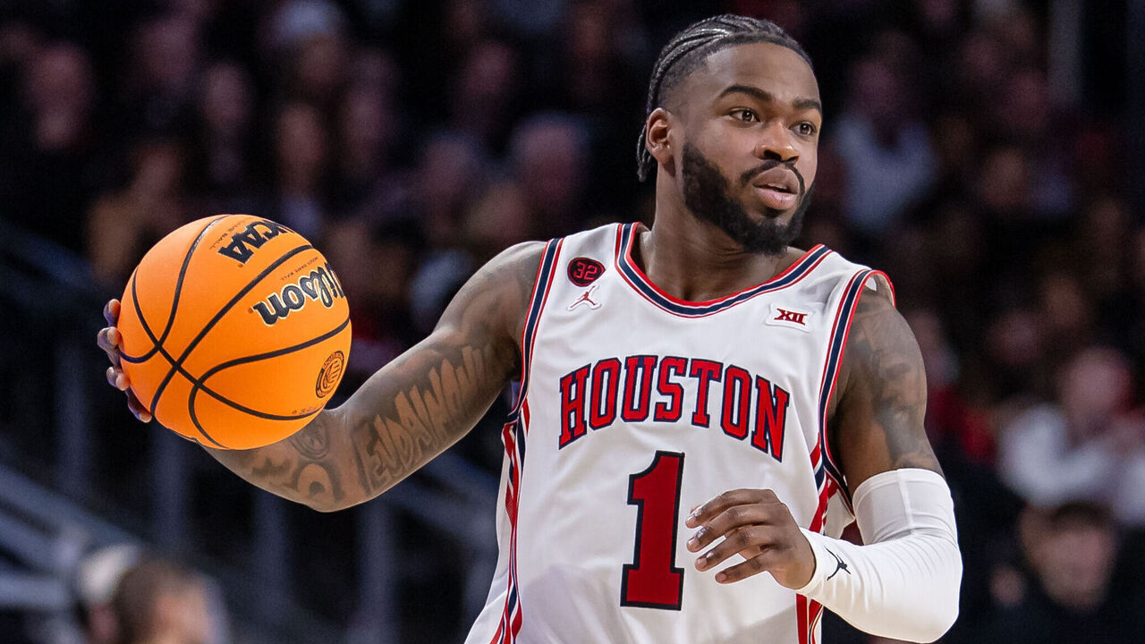 CINCINNATI, OHIO - FEBRUARY 10: Jamal Shead #1 of the Houston Cougars brings the ball up court during the game against the Cincinnati Bearcats at Fifth Third Arena on February 10, 2024 in Cincinnati, Ohio.