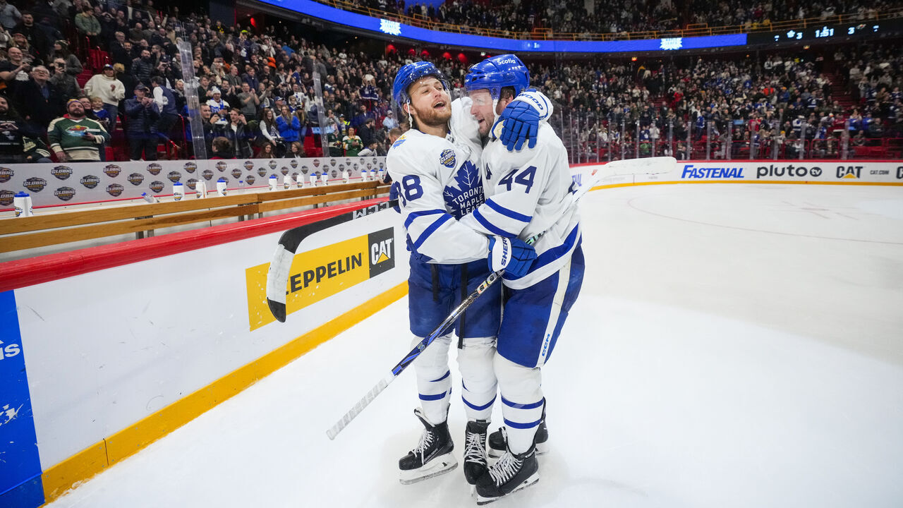 STOCKHOLM, SWEDEN - NOVEMBER 19: William Nylander #88 of the Toronto Maple Leafs celebrates after scoring the game winning goal against the Minnesota Wild with teammate Morgan Rielly #44 in overtime during the 2023 NHL Global Series Sweden at Avicii Arena on November 19, 2023 in Stockholm, Sweden.