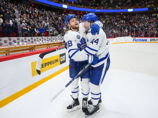 STOCKHOLM, SWEDEN - NOVEMBER 19: William Nylander #88 of the Toronto Maple Leafs celebrates after scoring the game winning goal against the Minnesota Wild with teammate Morgan Rielly #44 in overtime during the 2023 NHL Global Series Sweden at Avicii Arena on November 19, 2023 in Stockholm, Sweden.