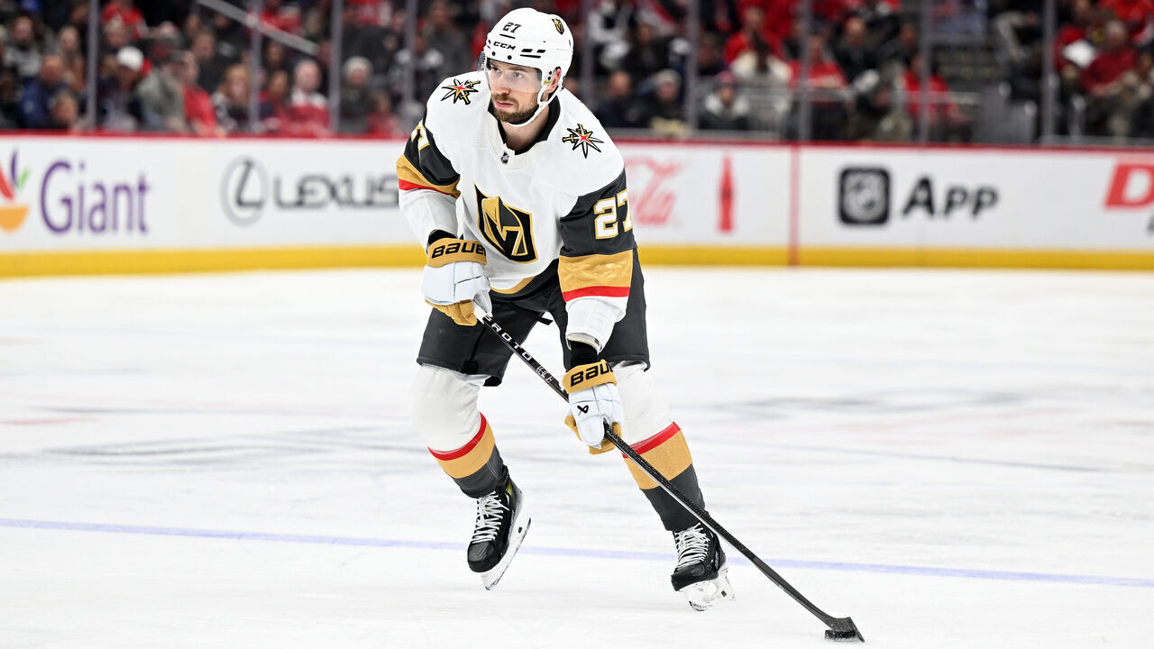 WASHINGTON, DC - NOVEMBER 14: Shea Theodore #27 of the Vegas Golden Knights handles the puck against the Washington Capitals at Capital One Arena on November 14, 2023 in Washington, DC.