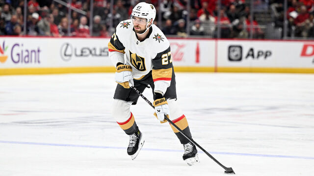 WASHINGTON, DC - NOVEMBER 14: Shea Theodore #27 of the Vegas Golden Knights handles the puck against the Washington Capitals at Capital One Arena on November 14, 2023 in Washington, DC.