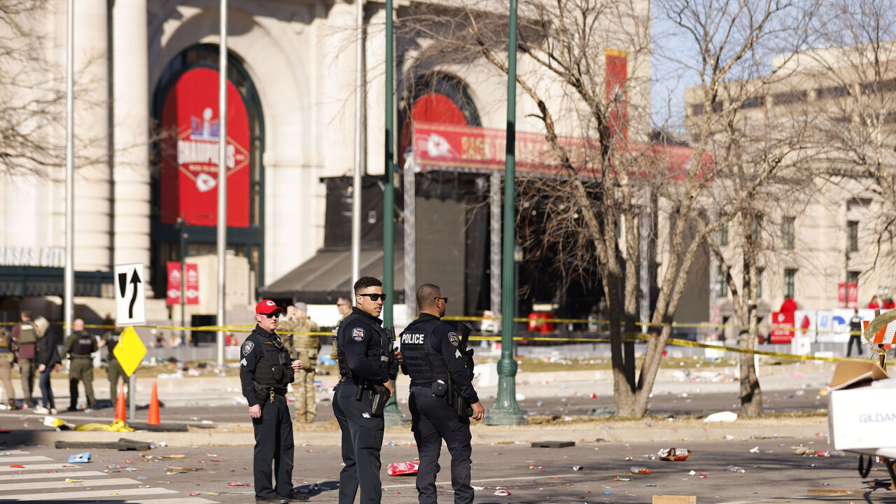 KANSAS CITY, MISSOURI - FEBRUARY 14: Law enforcement respond to a shooting at Union Station during the Kansas City Chiefs Super Bowl LVIII victory parade on February 14, 2024 in Kansas City, Missouri. Several people were shot and two people were detained after a rally celebrating the Chiefs Super Bowl victory.