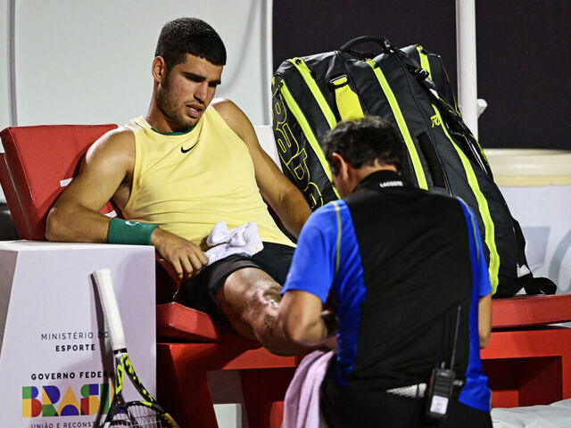Spain's Carlos Alcaraz gestures after suffering an injury during the ATP 500 Rio Open tennis match against Brazil's Carlos Monteiro in Rio de Janeiro, Brazil on February 20, 2024.