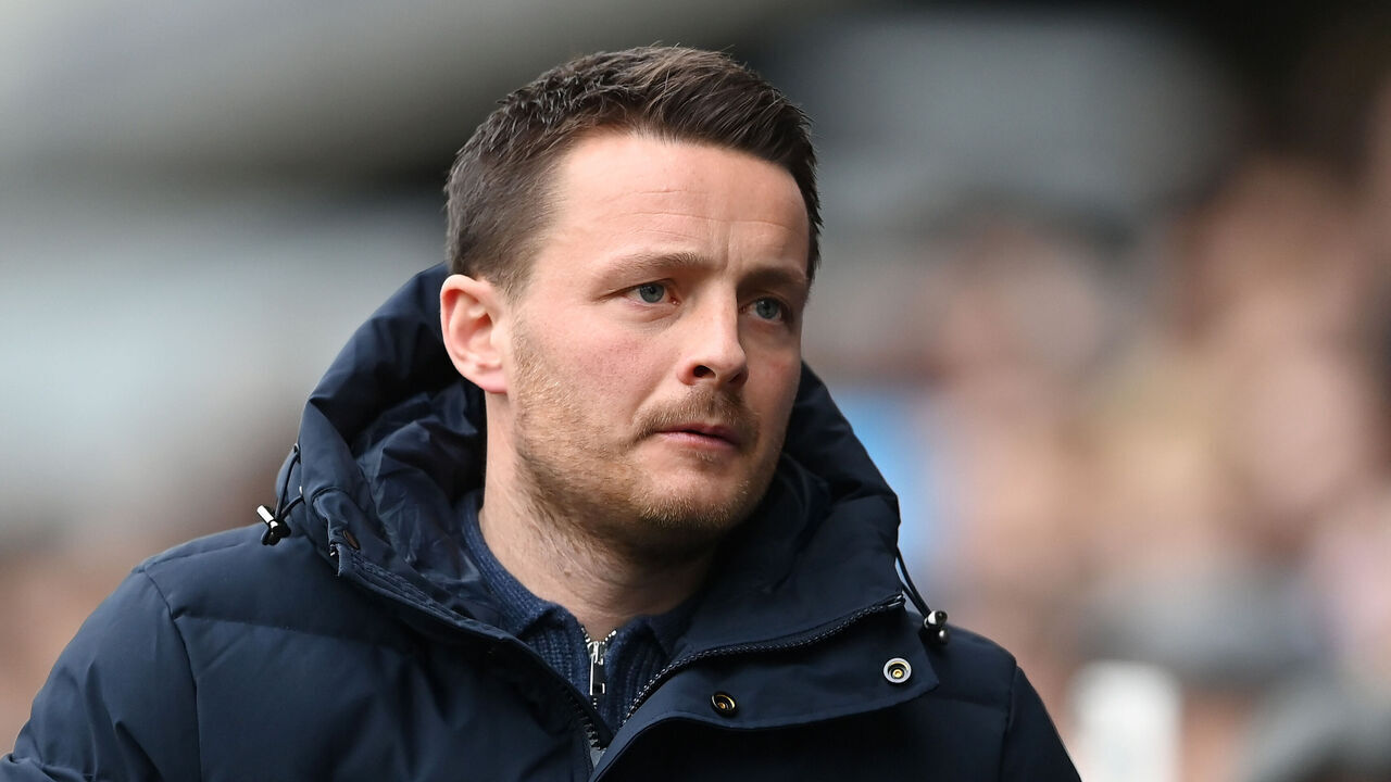 LONDON, ENGLAND - FEBRUARY 17: Millwall Manager, Joe Edwards looks on during the Sky Bet Championship match between Millwall and Sheffield Wednesday at The Den on February 17, 2024 in London, England.