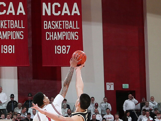 BLOOMINGTON, IN - JANUARY 16: Indiana Hoosiers center Kel'el Ware (1) goes up for the opening jump ball against Purdue Boilermakers center Zach Edey (15) on January 16, 2024, at Simon Skjodt Assembly Hall in Bloomington, Indiana.