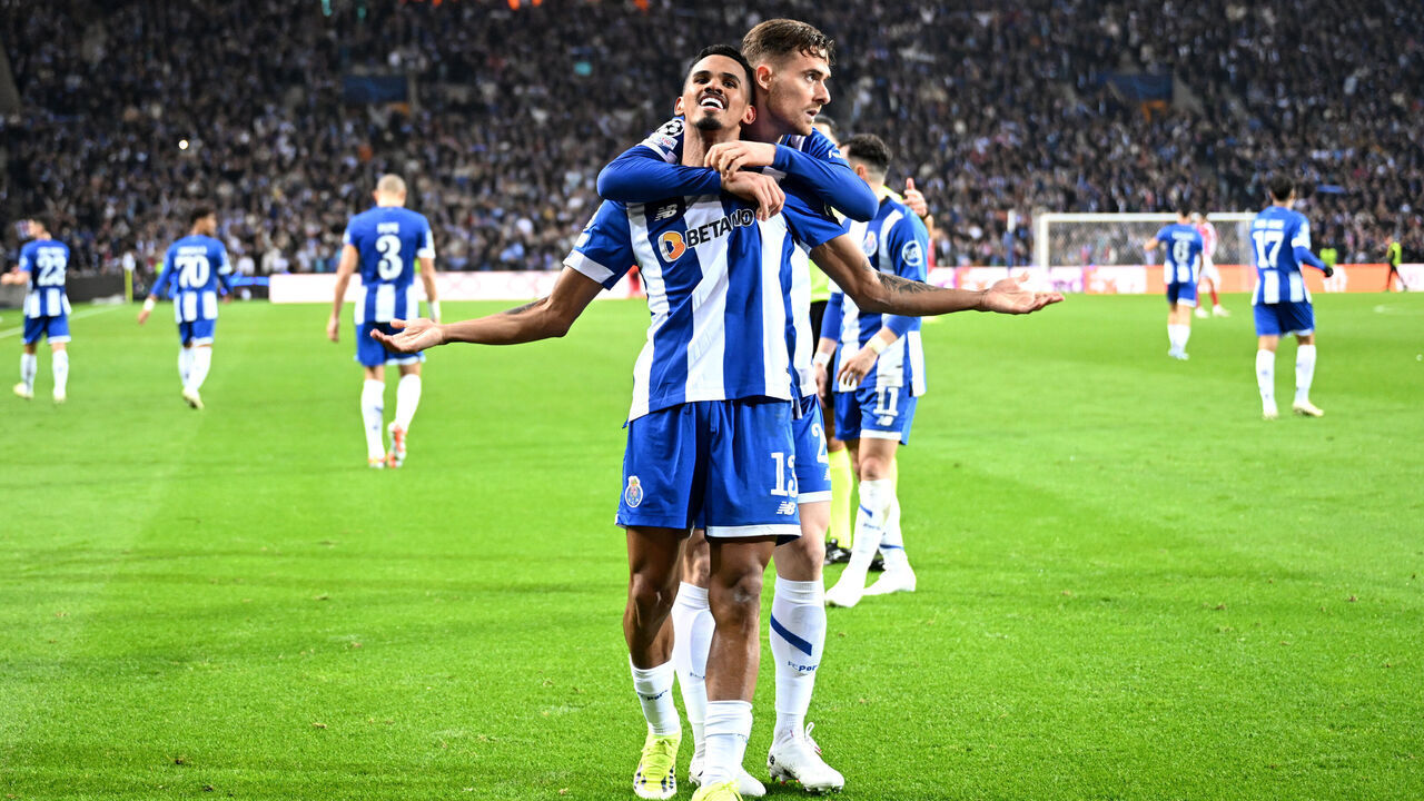 PORTO, PORTUGAL - FEBRUARY 21: Galeno of FC Porto celebrates scoring his team's first goal with teammate Toni Martinez during the UEFA Champions League 2023/24 round of 16 first leg match between FC Porto and Arsenal FC at Estadio do Dragao on February 21, 2024 in Porto, Portugal.