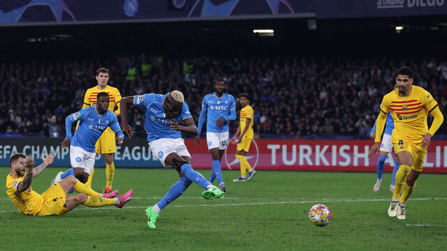 NAPLES, ITALY - FEBRUARY 21: Victor Osimhen of SSC Napoli shoots to score during the UEFA Champions League 2023/24 round of 16 first leg match between SSC Napoli and FC Barcelona at Stadio Diego Armando Maradona on February 21, 2024 in Naples, Italy.