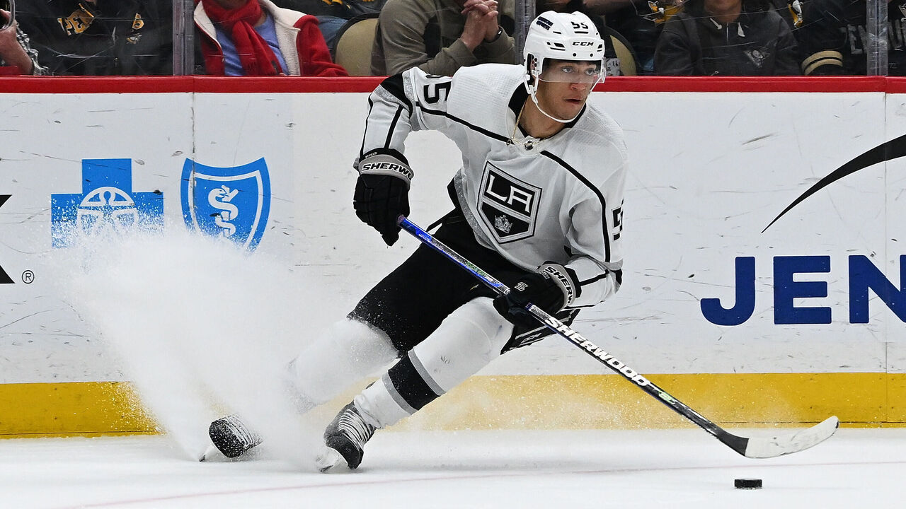 PITTSBURGH, PENNSYLVANIA - FEBRUARY 18: Quinton Byfield #55 of the Los Angeles Kings skates the puck in the second period against the Los Angeles Kings at PPG PAINTS Arena on February 18, 2024 in Pittsburgh, Pennsylvania.