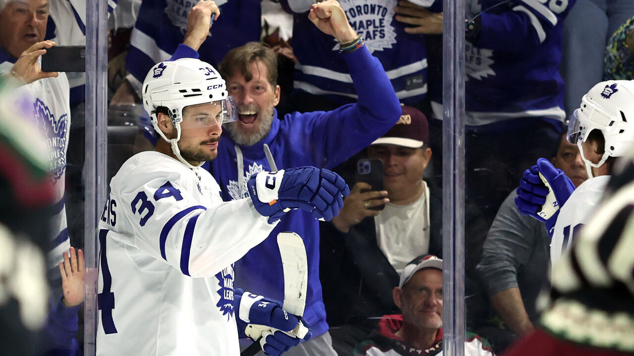 TEMPE, ARIZONA - FEBRUARY 21: Auston Matthews #34 of the Toronto Maple Leafs celebrates after scoring his 50th goal of the season against the Arizona Coyotes during the first period at Mullett Arena on February 21, 2024 in Tempe, Arizona.