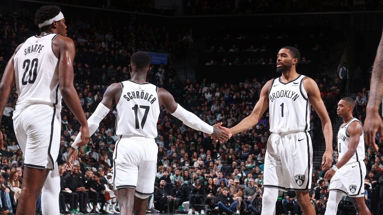 BROOKLYN, NY - FEBRUARY 13: Dennis Schroder #17 of the Brooklyn Nets & Mikal Bridges #1 of the Brooklyn Nets high five during the game on February 13, 2024 at Barclays Center in Brooklyn, New York. Mandatory Copyright Notice: Copyright 2024 NBAE