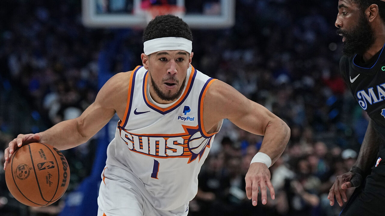 DALLAS, TX - FEBRUARY 22: Devin Booker #1 of the Phoenix Suns handles the ball during the game against the Dallas Mavericks on February 22, 2024 at the American Airlines Center in Dallas, Texas. Mandatory Copyright Notice: Copyright 2024 NBAE