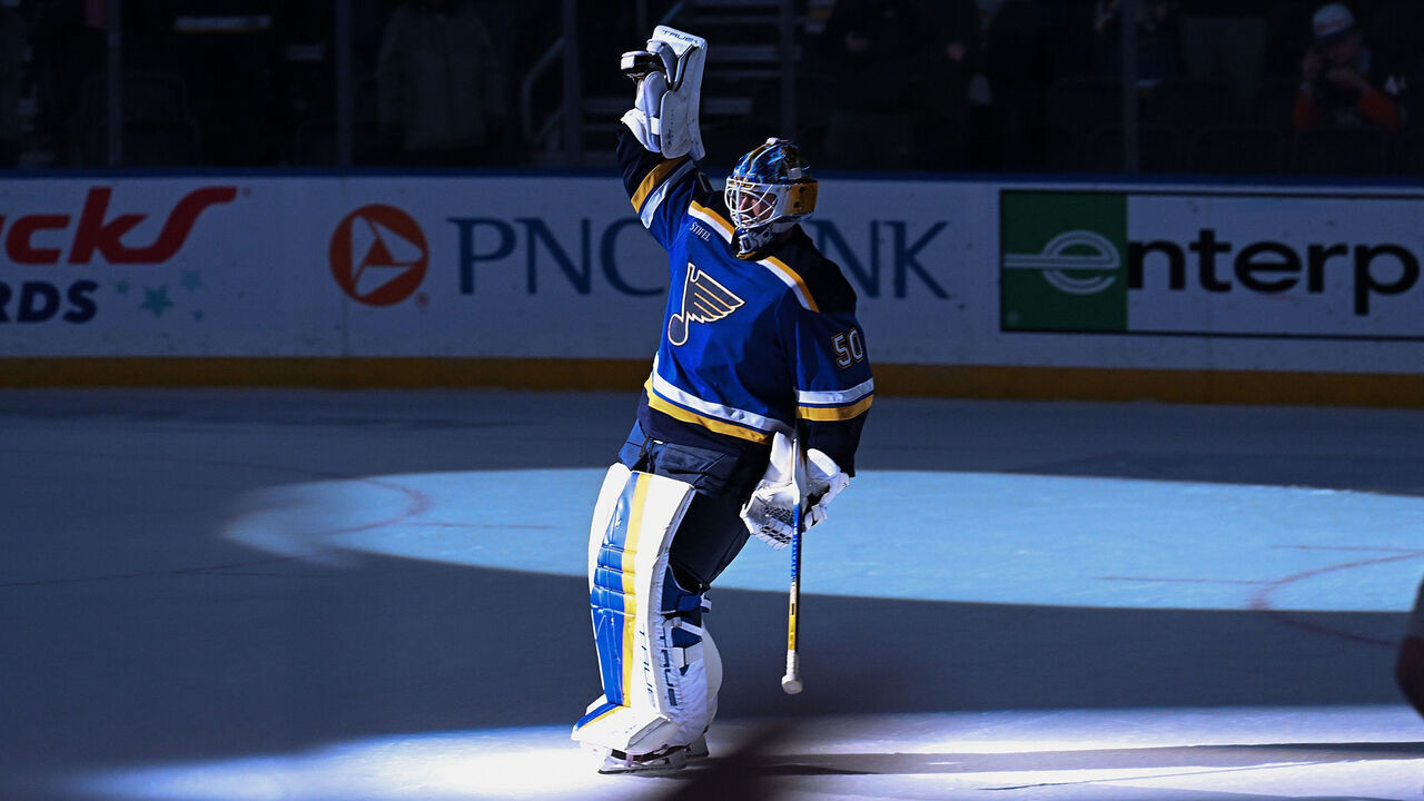 ST. LOUIS, MO - FEBRUARY 22: Jordan Binnington #50 of the St. Louis Blues acknowledges fans after beating the New York Islanders 4-0 on February 22, 2024 at the Enterprise Center in St. Louis, Missouri.