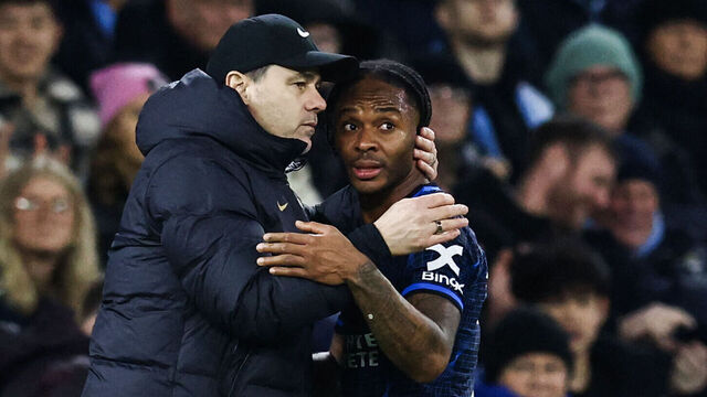 Chelsea's Argentinian head coach Mauricio Pochettino (L) congratulates Chelsea's English midfielder #07 Raheem Sterling as he leaves the pitch during the English Premier League football match between Manchester City and Chelsea at the Etihad Stadium in Manchester, north west England, on February 17, 2024.