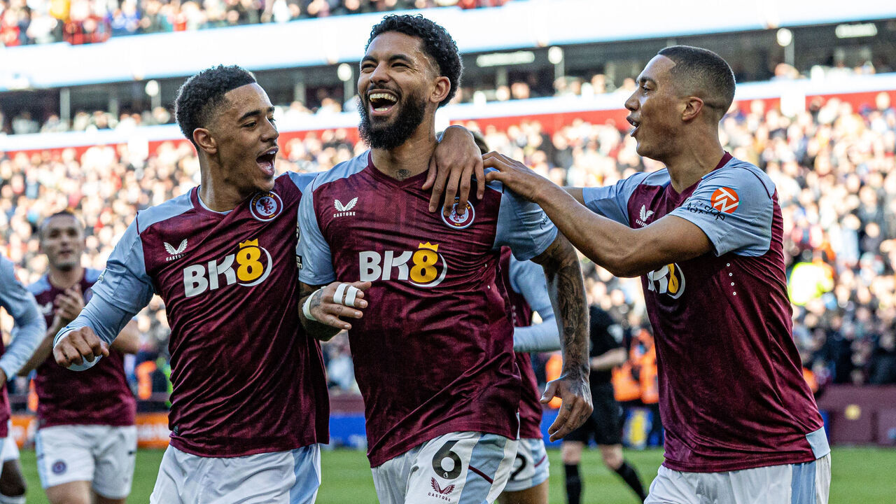 BIRMINGHAM, ENGLAND - FEBRUARY 24: Aston Villa's Douglas Luiz (centre) celebrates scoring his side's second goal with team mate Jacob Ramsey (left) and Youri Tielemans (right) during the Premier League match between Aston Villa and Nottingham Forest at Villa Park on February 24, 2024 in Birmingham, United Kingdom.