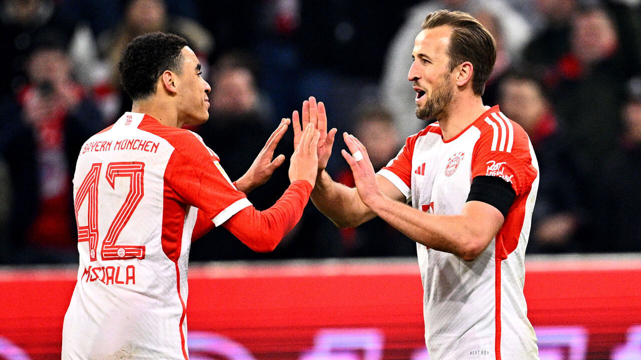 24 February 2024, Bavaria, Munich: Soccer: Bundesliga, Bayern Munich - RB Leipzig, Matchday 23, Allianz Arena. Harry Kane of Munich (r) celebrates with Jamal Musiala after his goal to make it 1-0. Photo: Tom Weller/dpa