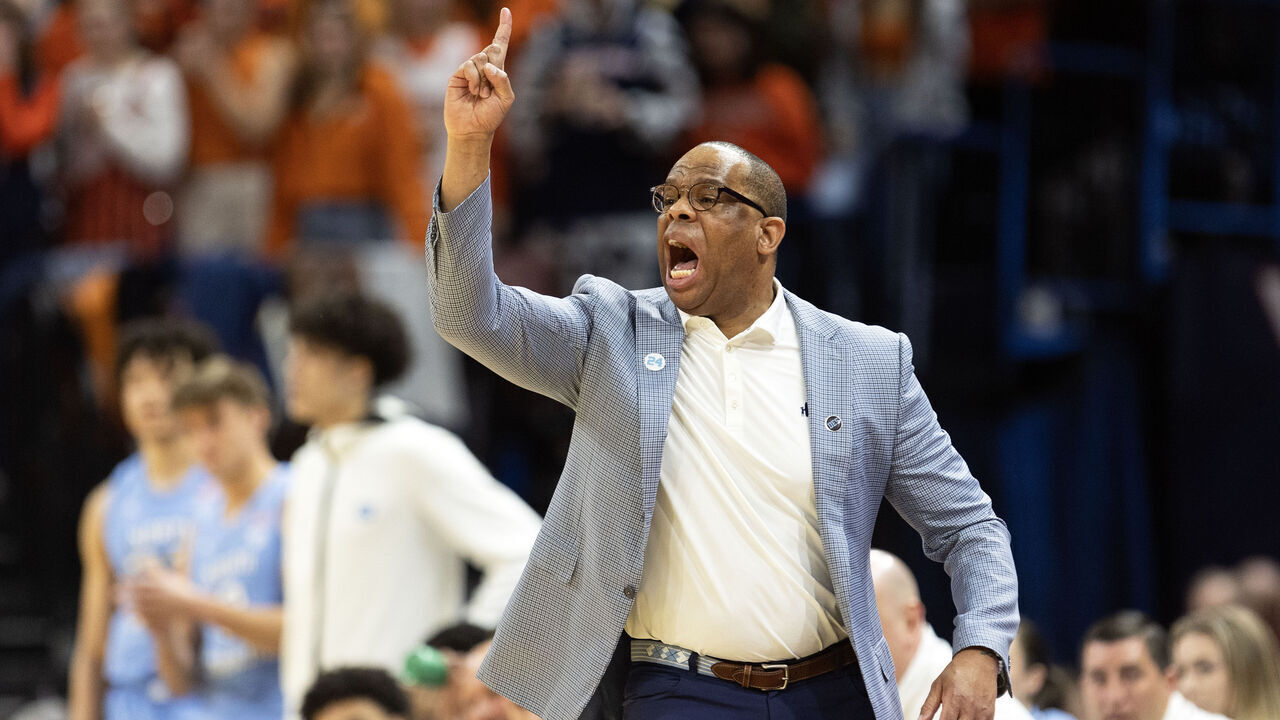 CHARLOTTESVILLE, VIRGINIA - FEBRUARY 24: Head coach Hubert Davis of the North Carolina Tar Heels reacts to a play in the first half during a game against the Virginia Cavaliers at John Paul Jones Arena on February 24, 2024 in Charlottesville, Virginia.