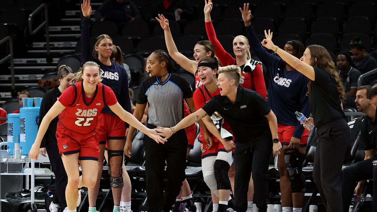 PHOENIX, AZ - DECEMBER 20: Gonzaga Bulldogs guard Brynna Maxwell (22) celebrates with the bench after a three point basket agaisnt the Arizona Wildcats during the second half of a basketball game between the Arizona Wildcats and the Gonzaga Bulldogs at the Jerry Colangelo's 2023 Hall of Fame Series on December 20, 2023, at Footprint Center in Phoenix, AZ.