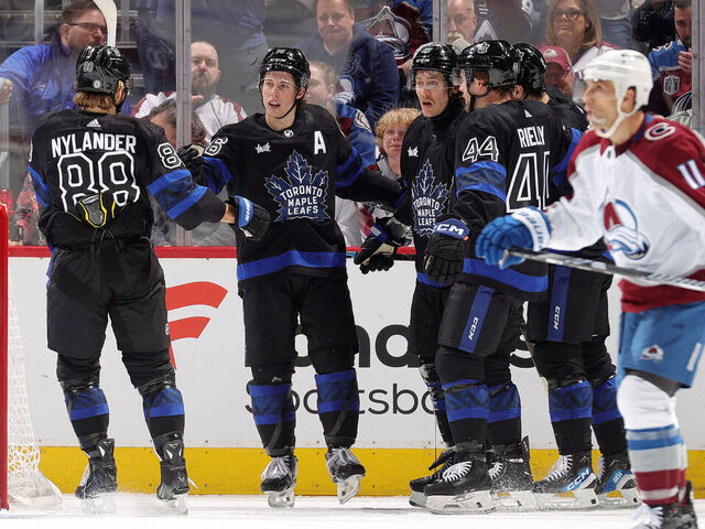 DENVER, COLORADO - FEBRUARY 24: William Nylander #88, Mitchell Marner #16, Tyler Bertuzzi #59, Morgan Rielly #44 and Auston Matthews #34 of the Toronto Maple Leafs celebrate a goal against the Colorado Avalanche at Ball Arena on February 24, 2024 in Denver, Colorado.