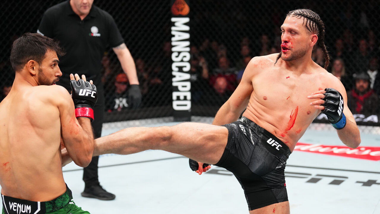 MEXICO CITY, MEXICO - FEBRUARY 24: (R-L) Brian Ortega kicks Yair Rodriguez of Mexico in a featherweight fight during the UFC Fight Night event at Arena CDMX on February 24, 2024 in Mexico City, Mexico.