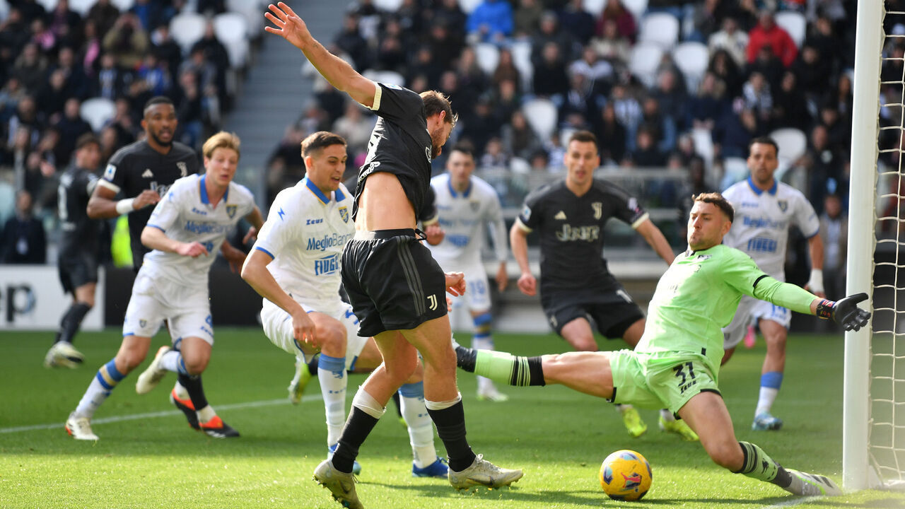 TURIN, ITALY - FEBRUARY 25: Daniele Rugani of Juventus scores his team's third goal against Michele Cerofolini of Frosinone Calcio during the Serie A TIM match between Juventus and Frosinone Calcio at Allianz Stadium on February 25, 2024 in Turin, Italy.