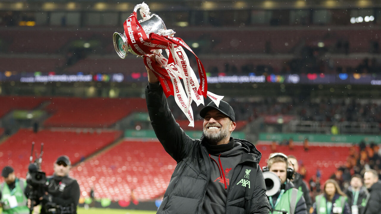 LONDON, ENGLAND - FEBRUARY 25: Jurgen Klopp, Manager of Liverpool celebrates with the trophy after winning the Carabao Cup Final match between Chelsea and Liverpool at Wembley Stadium on February 25, 2024 in London, England.