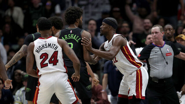 NEW ORLEANS, LOUISIANA - FEBRUARY 23: Naji Marshall #8 of the New Orleans Pelicans and Jimmy Butler #22 of the Miami Heat are involved in an altercation during the fourth quarter of an NBA game at Smoothie King Center on February 23, 2024 in New Orleans, Louisiana. Both players were ejected.