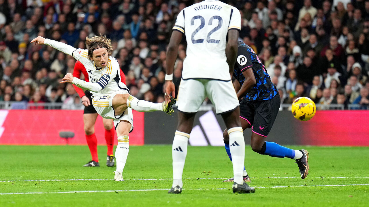 MADRID, SPAIN - FEBRUARY 25: Luka Modric of Real Madrid scores his team's first goal during the LaLiga EA Sports match between Real Madrid CF and Sevilla FC at Estadio Santiago Bernabeu on February 25, 2024 in Madrid, Spain.