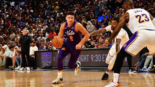 PHOENIX, AZ - FEBRUARY 25: Grayson Allen #8 of the Phoenix Suns drives to the basket during the game against the Los Angeles Lakers on February 25, 2024 at Footprint Center in Phoenix, Arizona. Mandatory Copyright Notice: Copyright 2024 NBAE