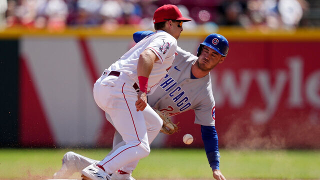CINCINNATI, OHIO - SEPTEMBER 01: Cody Bellinger #24 of the Chicago Cubs steals second base past Spencer Steer #7 of the Cincinnati Reds in the sixth inning during game one of a doubleheader at Great American Ball Park on September 01, 2023 in Cincinnati, Ohio.