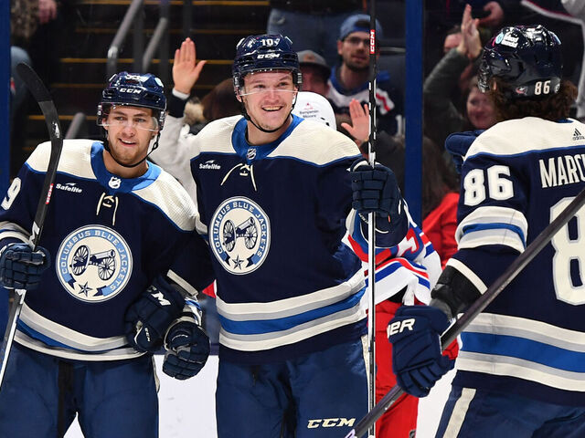 COLUMBUS, OHIO - FEBRUARY 25: Dmitri Voronkov #10 of the Columbus Blue Jackets celebrates his first period goal with teammates Yegor Chinakhov #59 and Kirill Marchenko #86 of the Columbus Blue Jackets during a game against the New York Rangers at Nationwide Arena on February 25, 2024 in Columbus, Ohio.