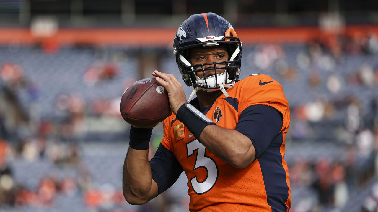 DENVER, CO - DECEMBER 31: Russell Wilson #3 of the Denver Broncos warms up prior to an NFL football game against the Los Angeles Chargers at Empower Field at Mile High on December 31, 2023 in Denver, Colorado.