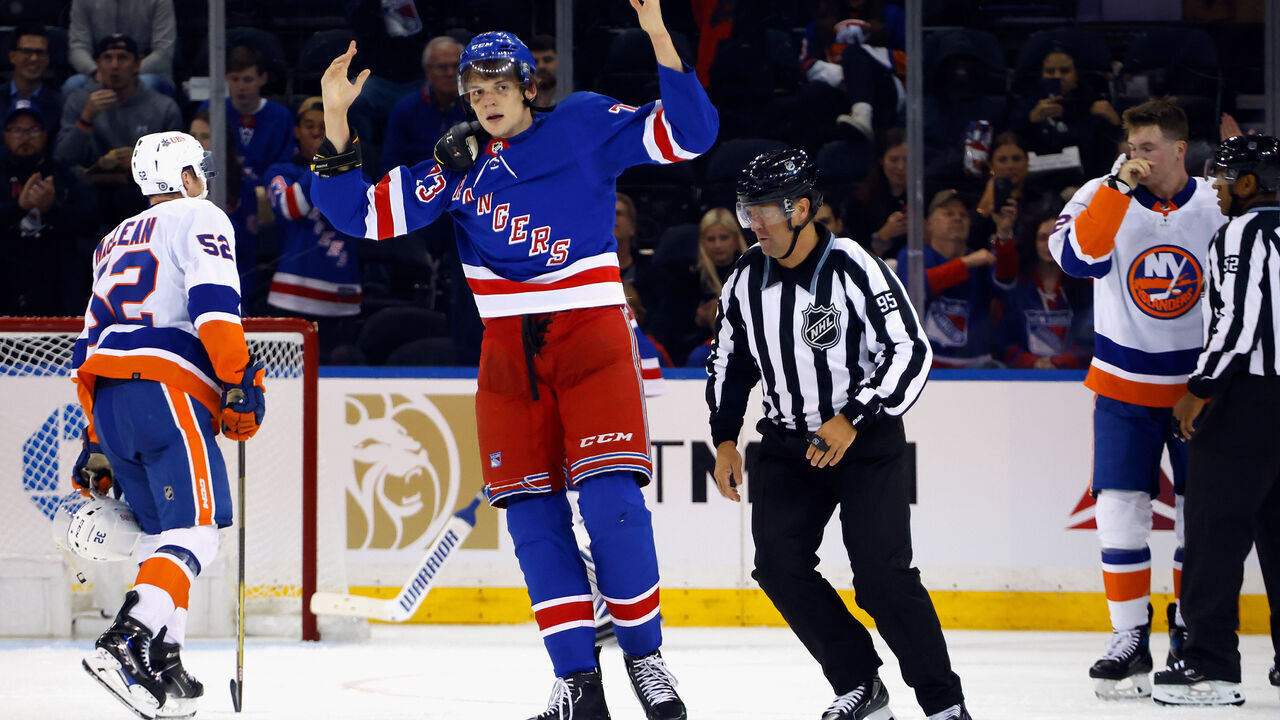 NEW YORK, NEW YORK - SEPTEMBER 26: Matt Rempe #73 of New York Rangers reacts following his fight against Ross Johnston #32 of New York Islanders during a preseason game at Madison Square Garden on September 26, 2023 in New York City.