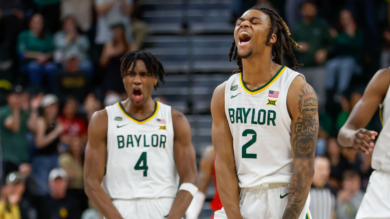 WACO, CA - FEBRUARY 24: Baylor Bears guard Jayden Nunn (2) and Baylor Bears guard Ja'Kobe Walter (4) both scream and flex after a three point shot is made during the Big 12 college basketball game between Baylor Bears and Houston Cougars on February 24, 2024, at Foster Pavilion in Waco, Texas.